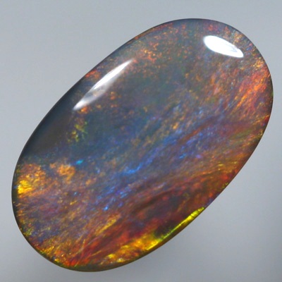 SOLID SEMI BLACK OPAL Burning red and copper over blue